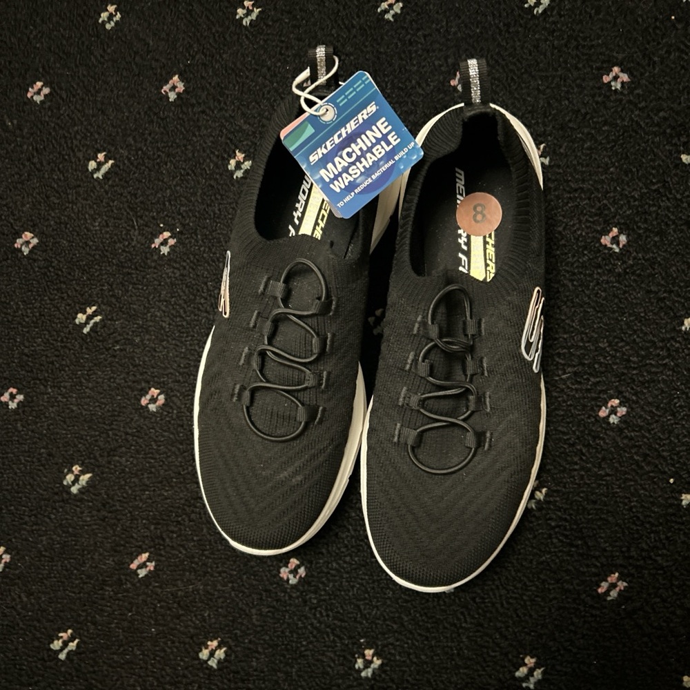 Skechers Black Knit Slip-Ons